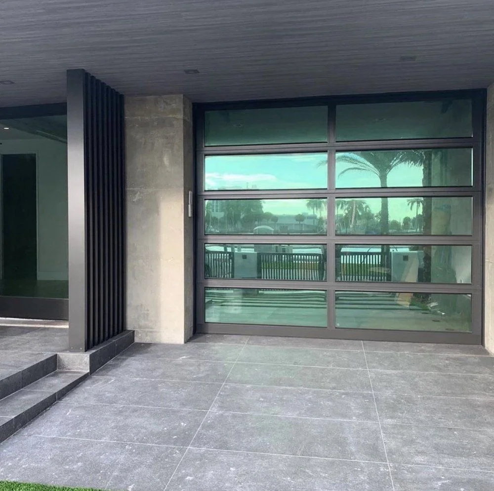 Glass garage door & exterior finish — Moncada project gallery