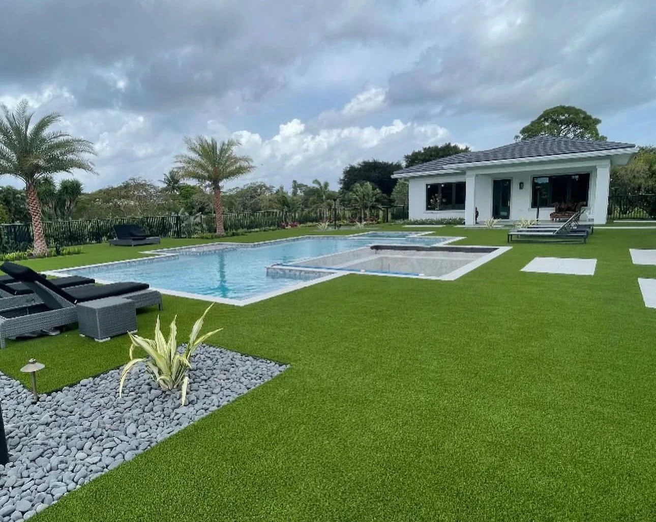 Pool, lawn & patio — Moncada project gallery