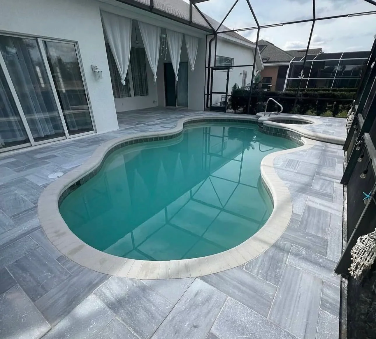 Screened pool & paver deck — Moncada project gallery